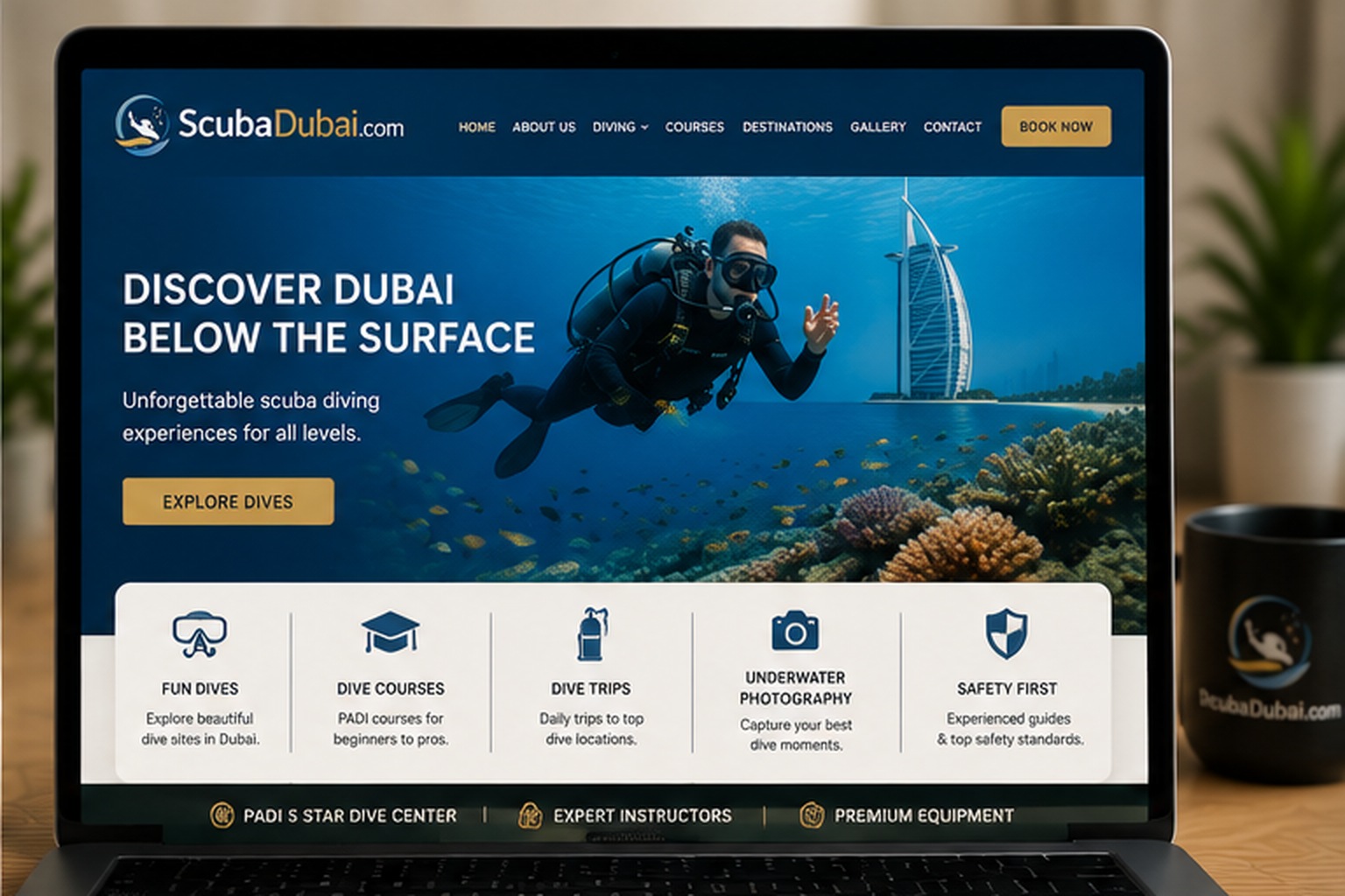 ScubaDubai.Com website concept displayed on a laptop featuring Dubai scuba diving, dive courses, underwater photography and guided dive experiences.